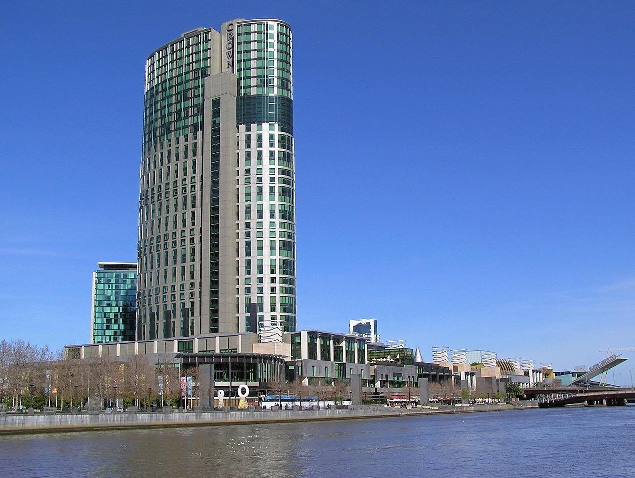 Luxurious casino interior with classic tables, rich wood and chocolate tones